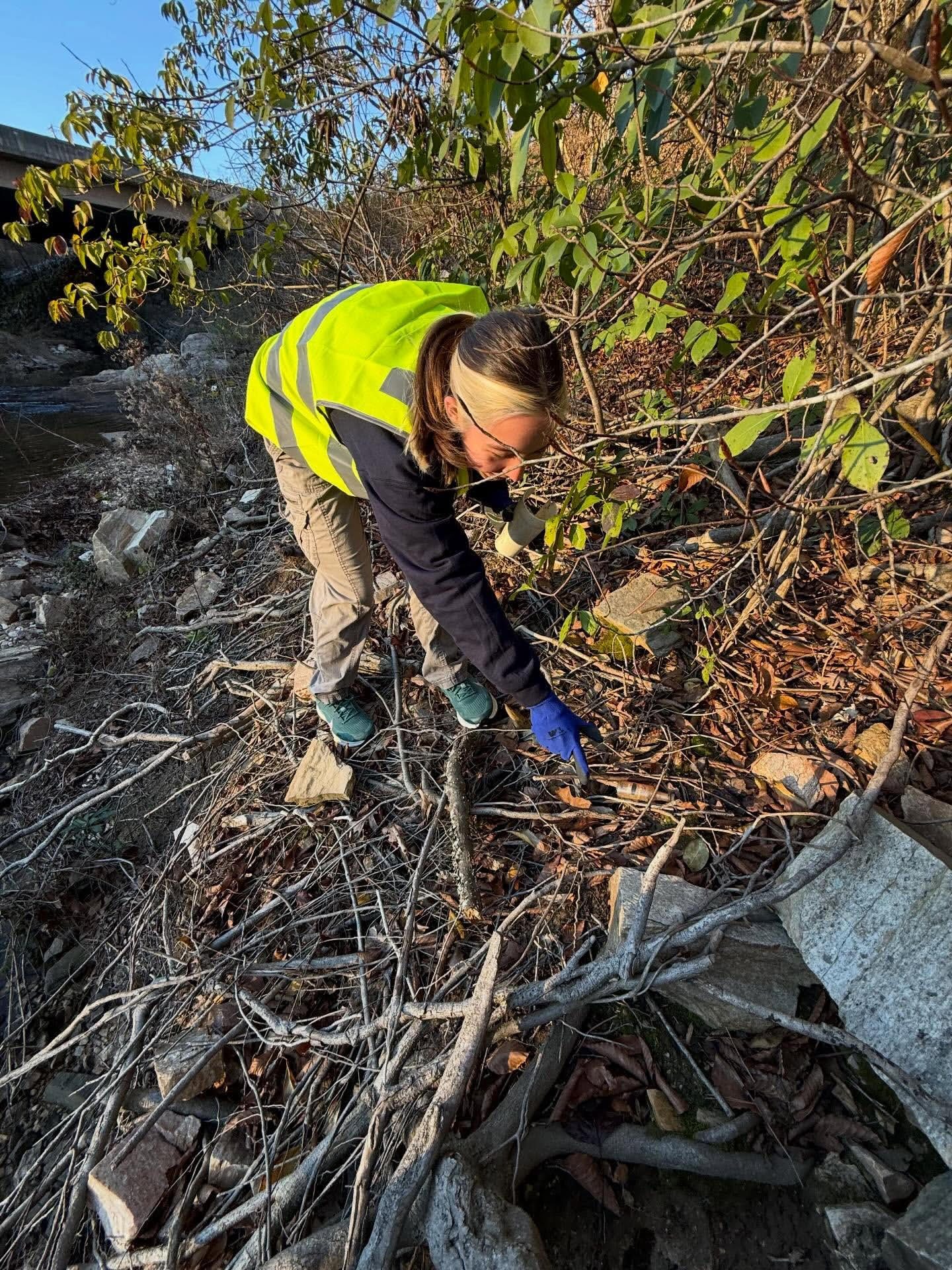 Liz Koifman participating in a Crop, Soil, and Environmental Science Club cleanup