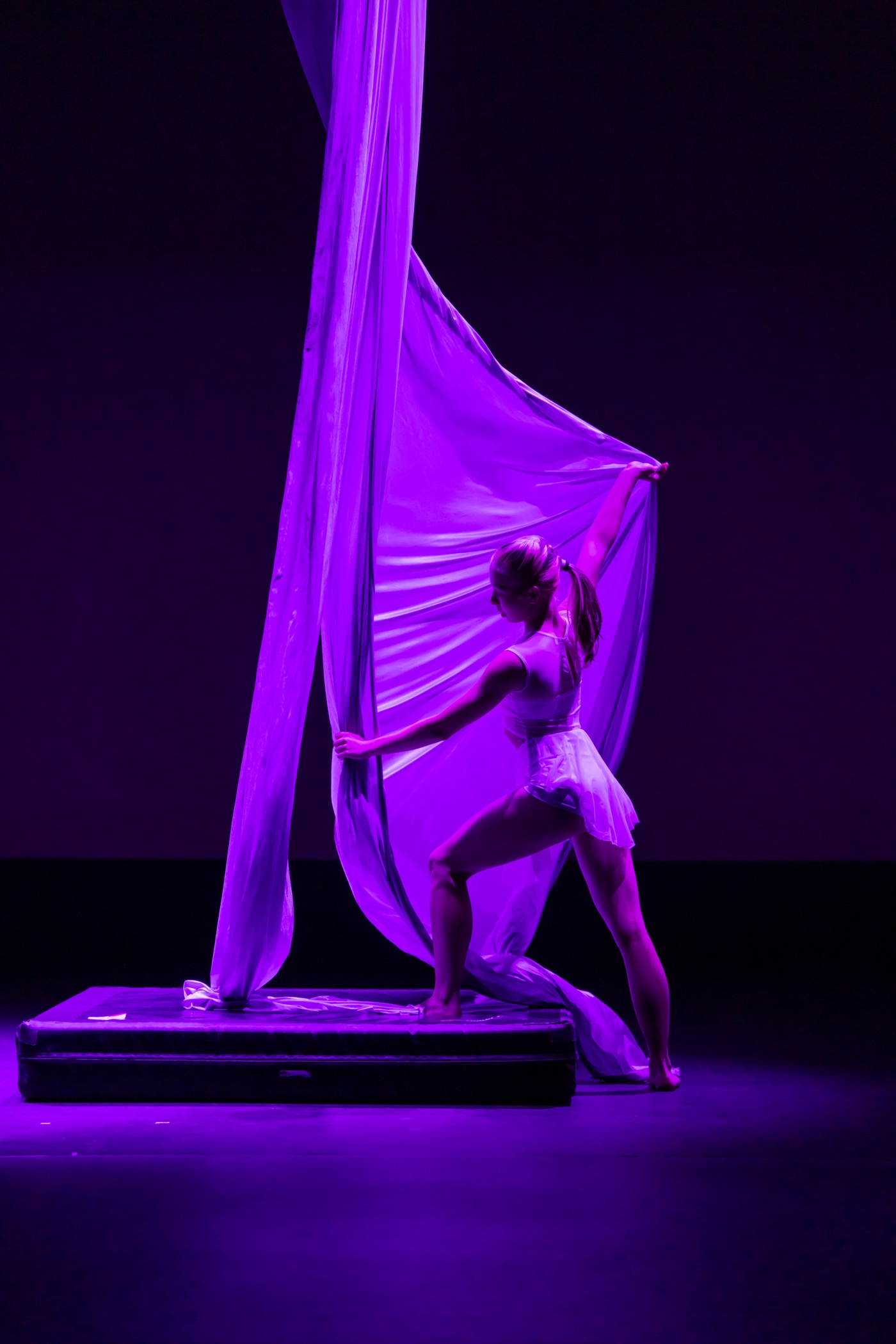 Liz Koifman posing with aerial fabric in A Light To My Path